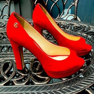 Red peep toe pumps